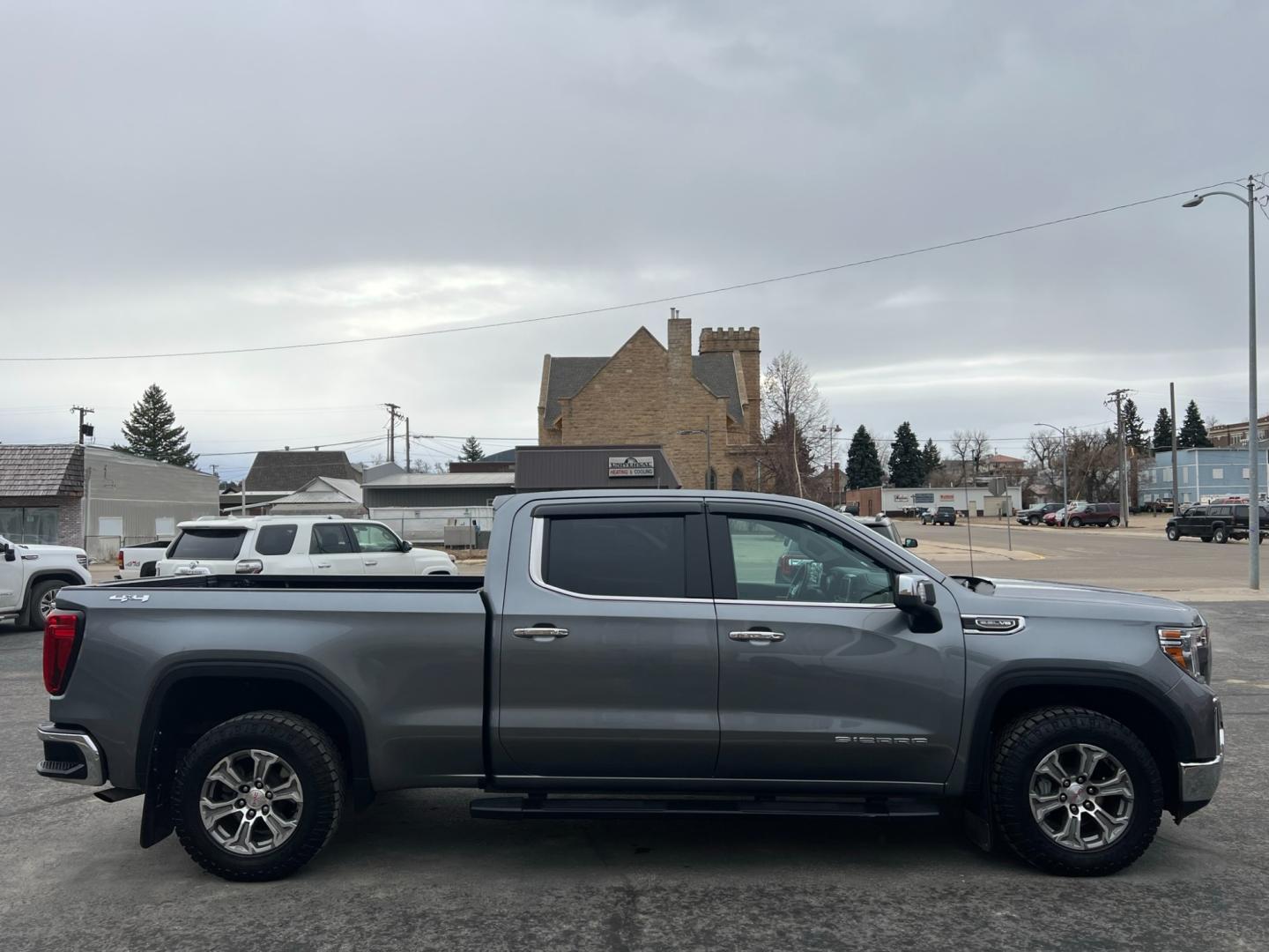 2021 Blue /Blue GMC Sierra 1500 SLT (3GTU9DED7MG) with an 5.3L V8 engine, automatic transmission, located at 116 5th Avenue South, Lewistown, MT, 59457, 47.063877, -109.427879 - Unleash the Power of the Roads with Our Pre-Owned 2021 GMC Sierra 1500 Crew Cab 4WD! Experience the thrill of the open road in this stunning GMC Sierra 1500, a beast on wheels that's ready to conquer any terrain! Don't miss your chance to own this powerful machine - now available in our pre-owned - Photo#1